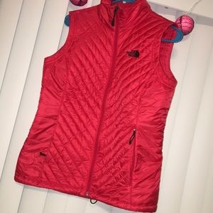 Red north face puffer vest